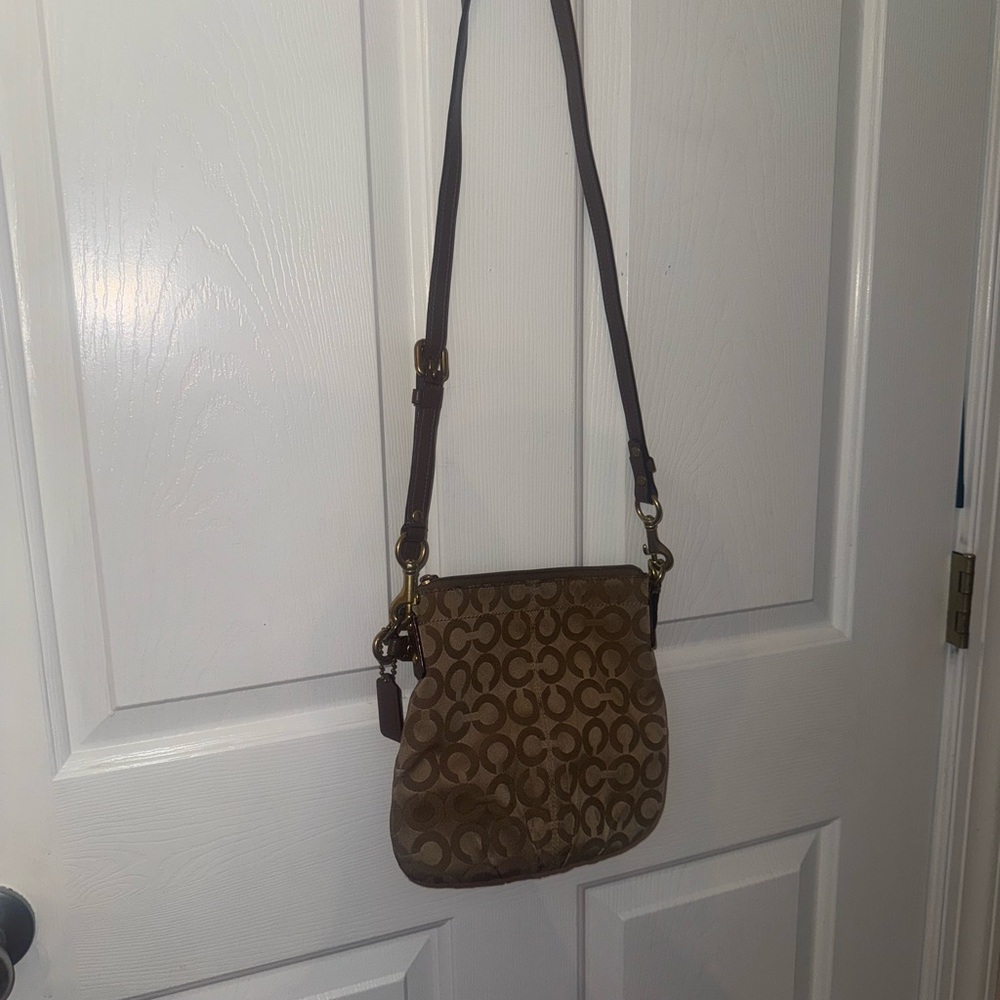 Vintage Coach Brown Crossbody Bag with Sleek Design